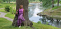 The Vivid Ruffle Maxi Skirt — lakeside park shot in violet polka-dot Ankara print