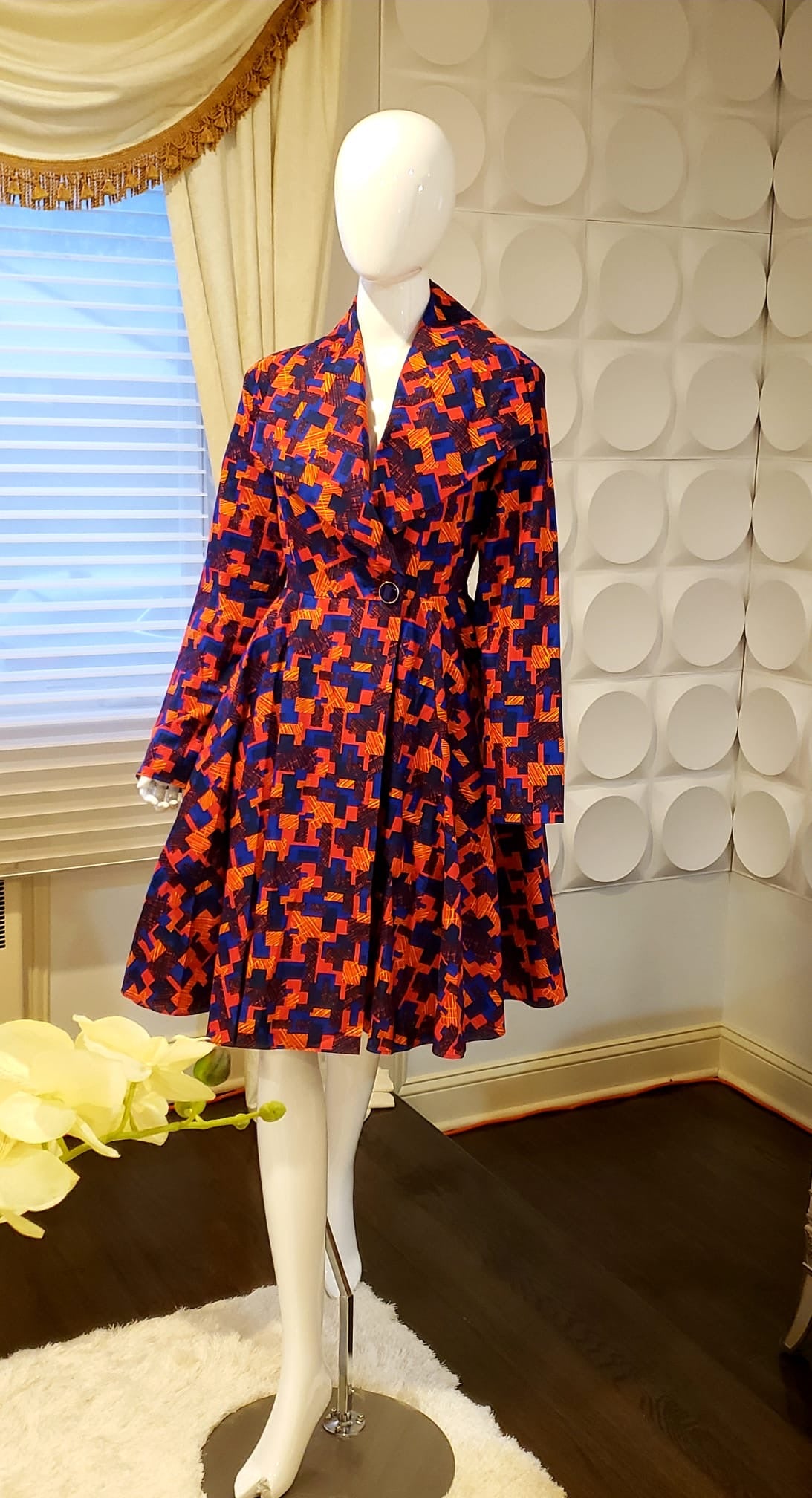 The Mosaic Coat Dress three-quarter view